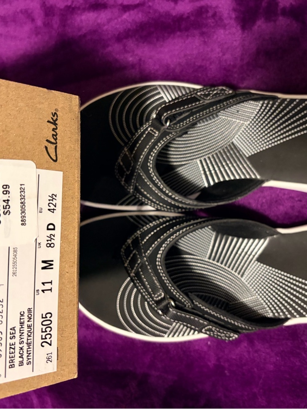 Clarks Black Slip-On Mules with White Accent